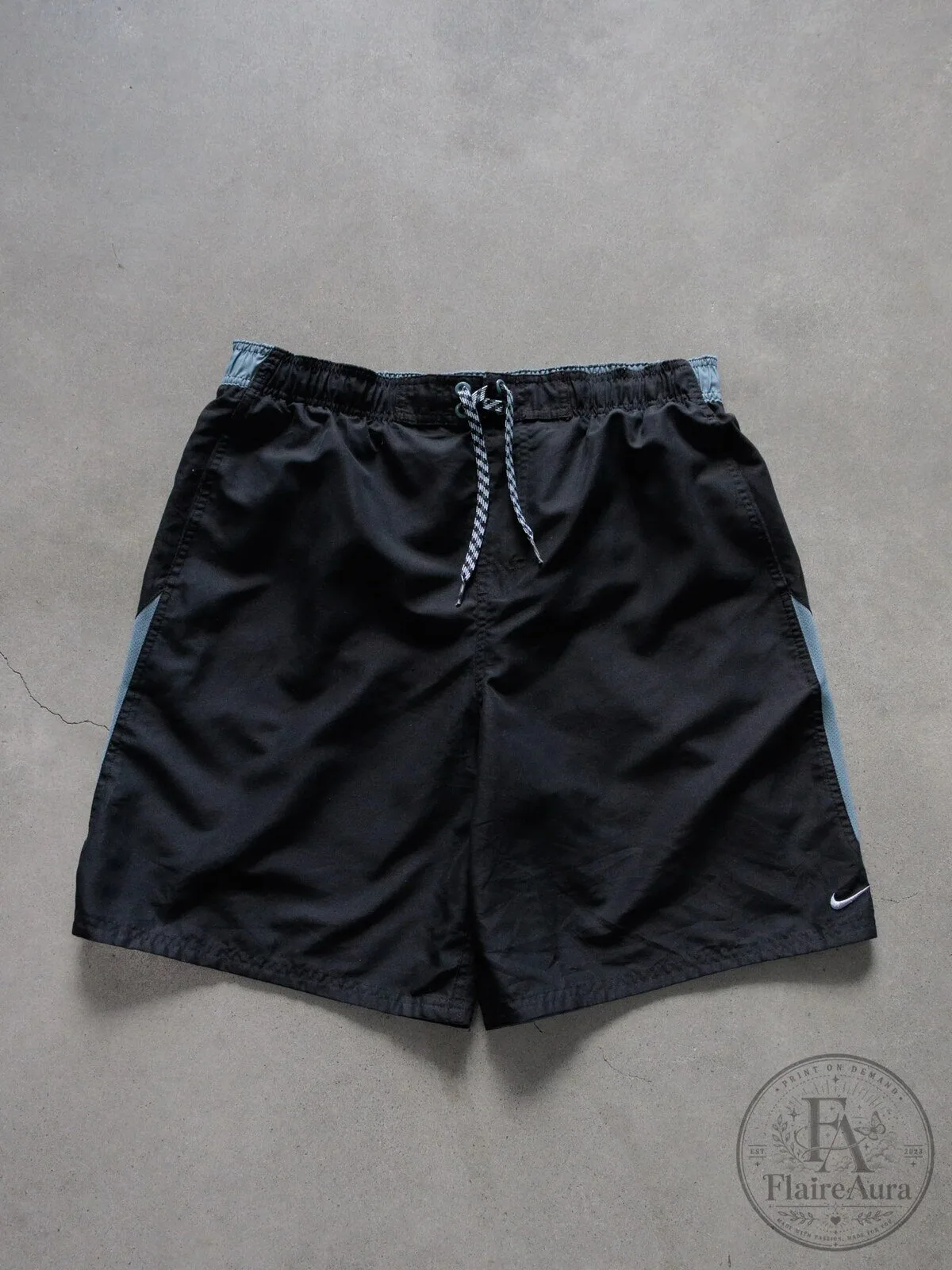 Vintage Nike Black Athletic Shorts with Drawstring Waist and Side Panels